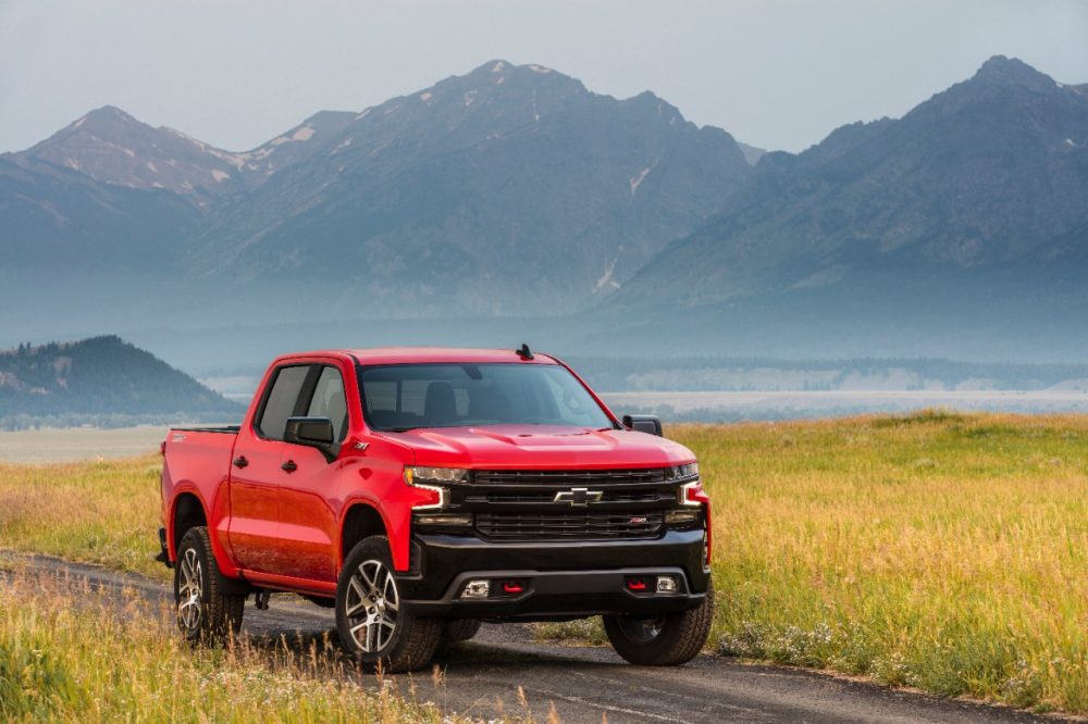 The 2021 Chevrolet Silverado LT Trail Boss in front of a mountain