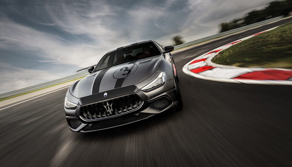 Red 2021 Maserati Ghibli Trofeo at the track for those who can't access the MC20 Master Course