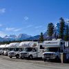 Row of RVs, mountain backdrop