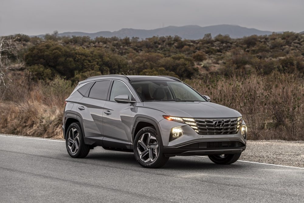 Front side view of 2022 Hyundai Tucson PHEV on road