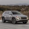 Front side view of 2022 Hyundai Tucson PHEV on road