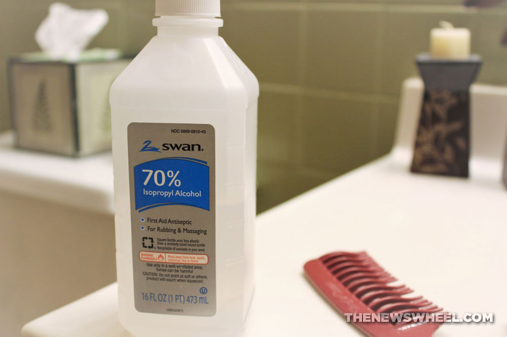 rubbing alcohol bottle bathroom first aid supplies