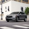 The 2021 Buick Enclave driving on the street