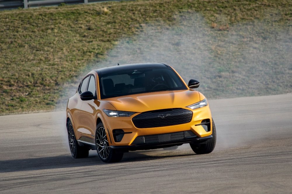 2021 Ford Mustang Mach-E GT in Cyber Orange with smoking tires