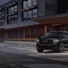 2021 GMC Acadia Elevation in front of a building