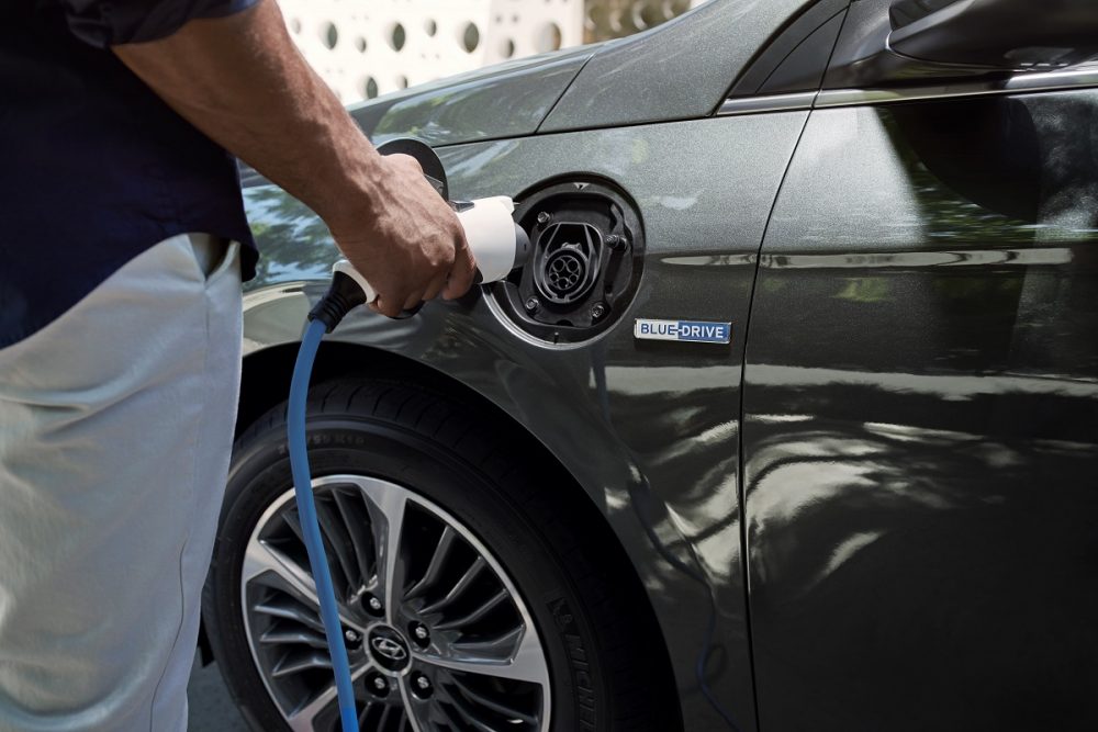 Close-up of 2021 Hyundai Ioniq Hybrid Plug-In charging port and charging cable