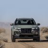 Front view of 2022 Hyundai Santa Cruz driving on off-road trail