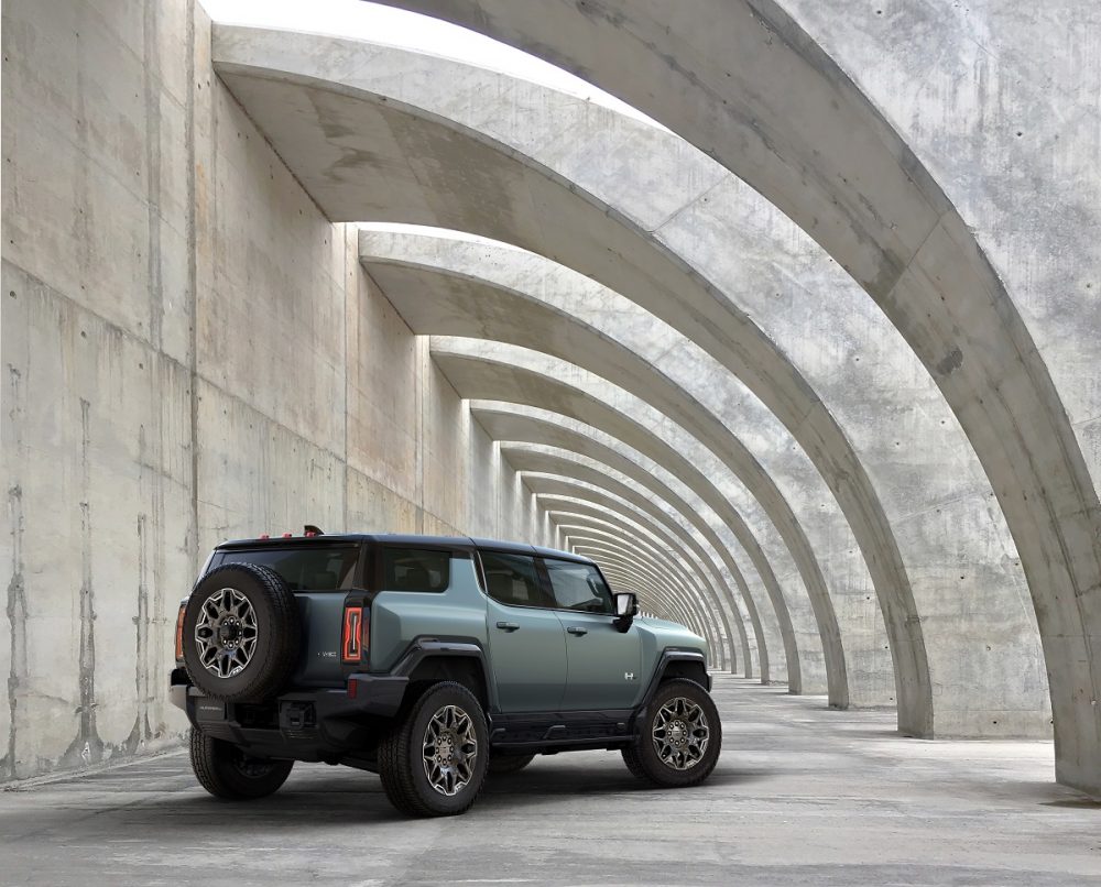 Rear side view of parked 2024 GMC Hummer EV SUV