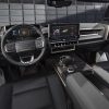 2024 GMC Hummer EV SUV dashboard and front seats