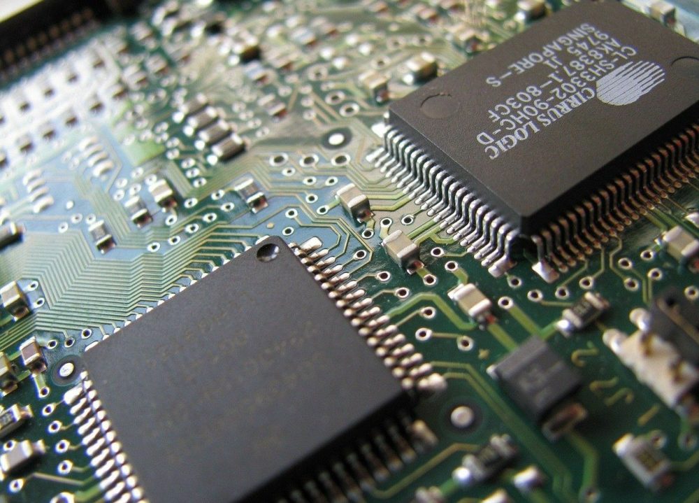 A set of computer chips sitting on a motherboard