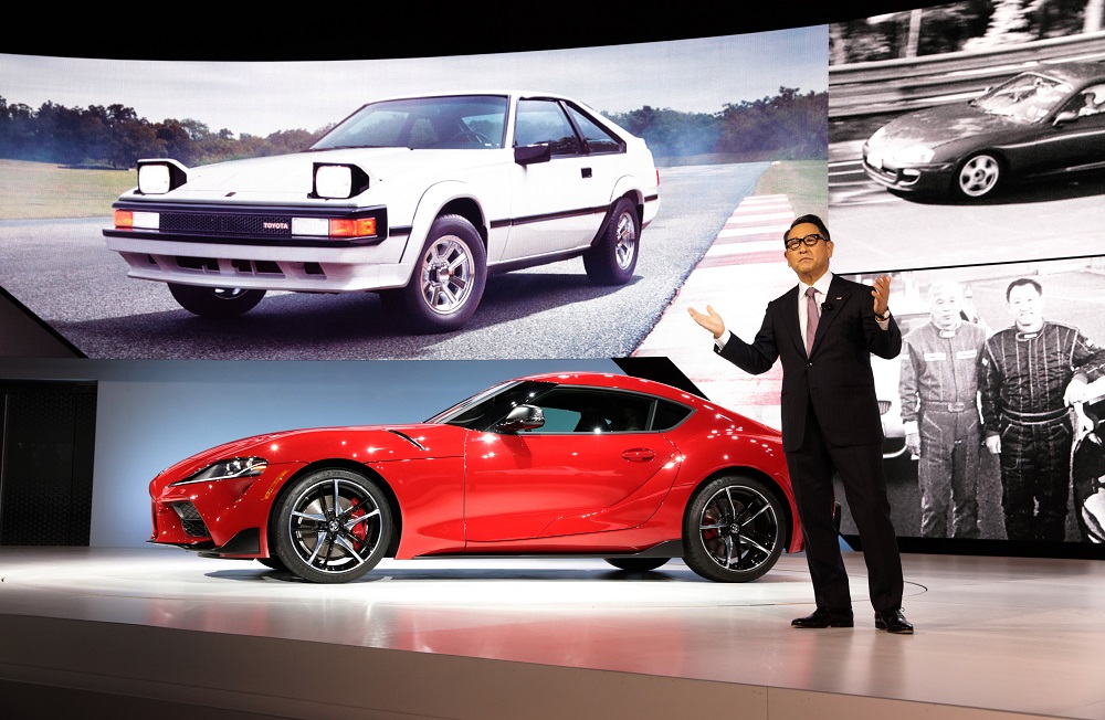 Akio Toyoda, 2021 World Car Person of the Year, on stage next to 2022 GR 86