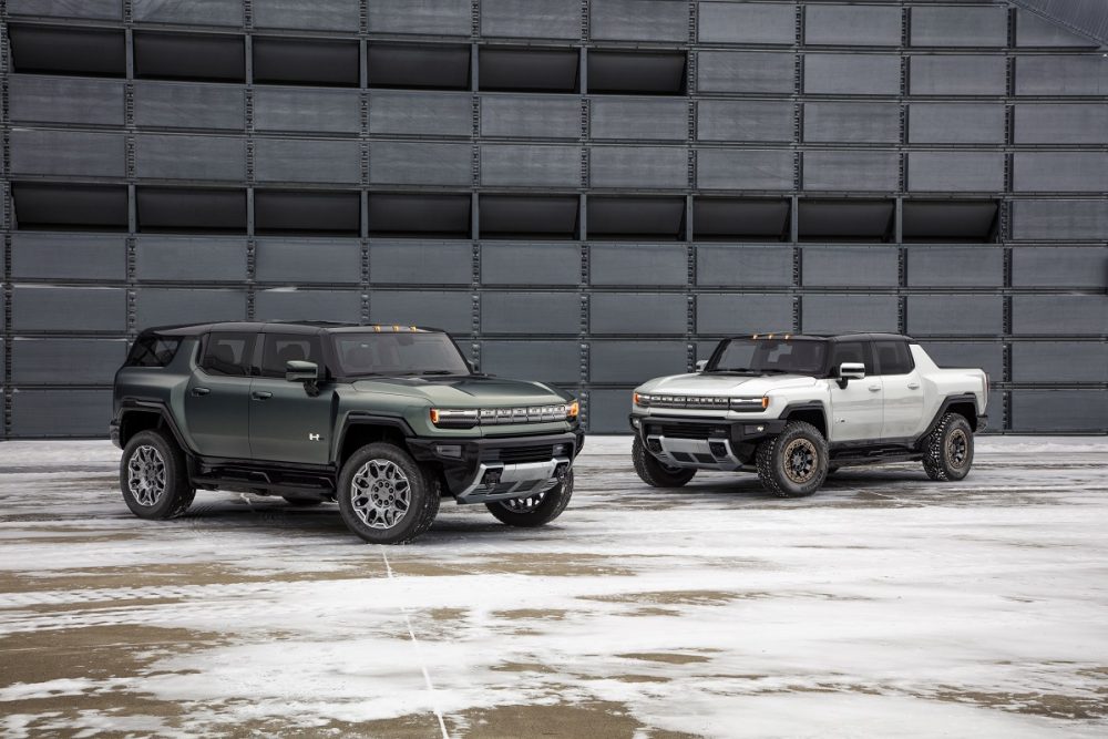 Front side views of parked GMC Hummer EV SUV and GMC Hummer EV