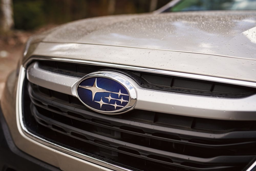 The Subaru logo on a silver vehicle