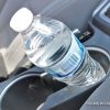 water bottle in car cup holder for drinking