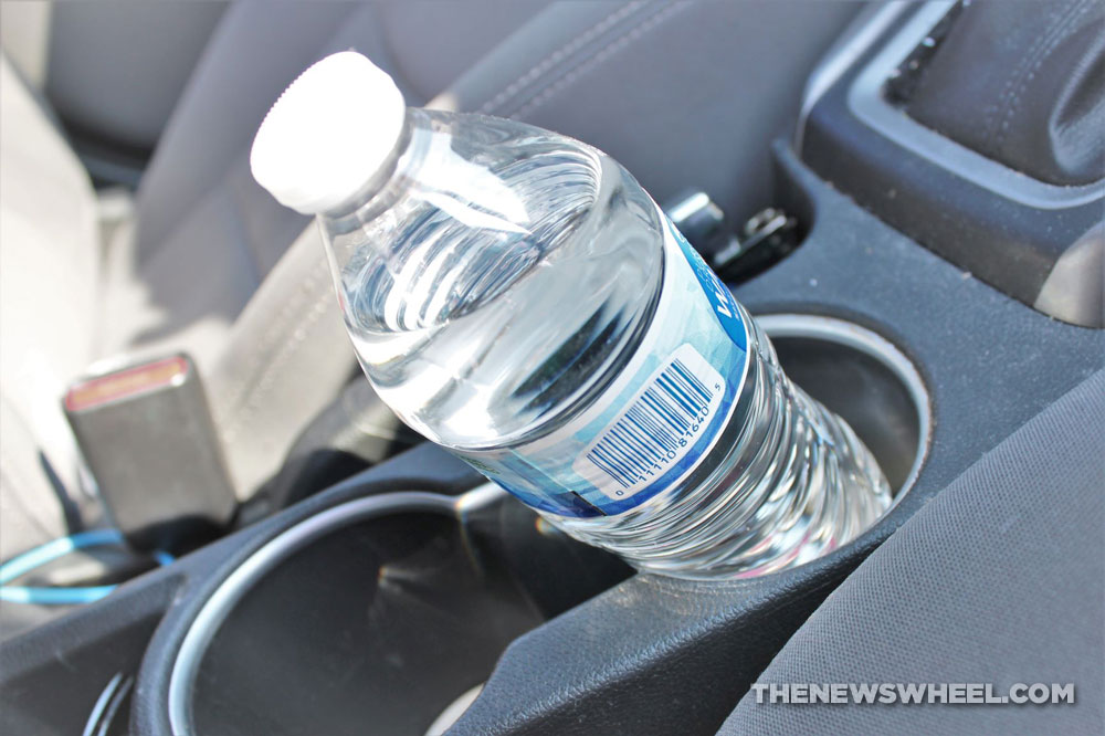 water bottle in car cup holder for drinking