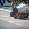 Castroneves kissing the bricks