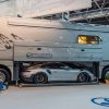 Motorhome with a Porsche 911 GT2 RS in a built-in garage