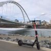 a Spin scooter by the Walterdale Bridge in Edmonton, Alberta, Canada