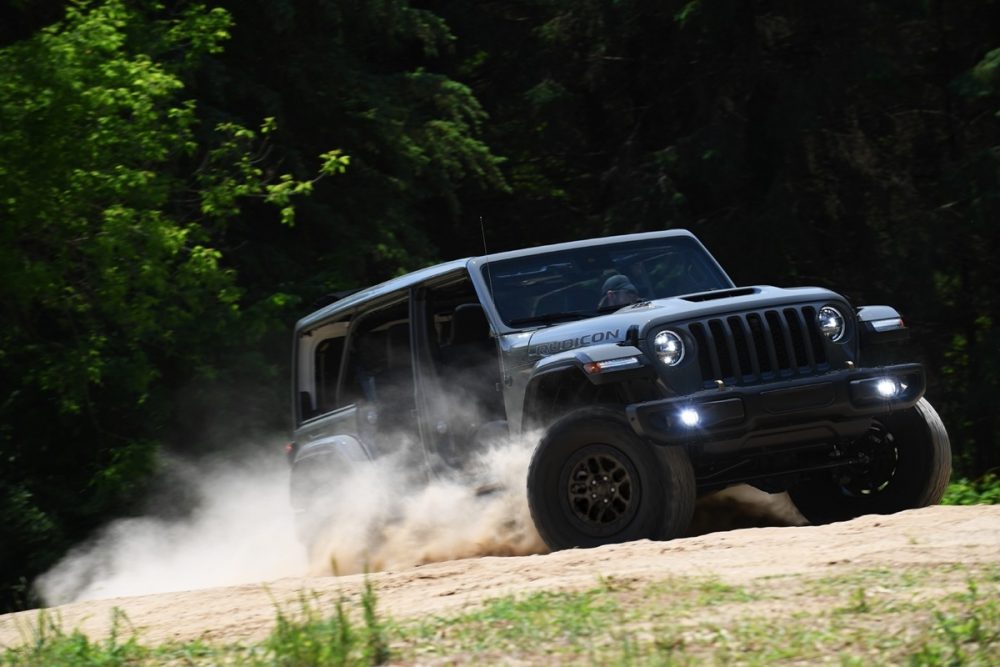 The 2021 Jeep Wrangler Rubicon 392 with the Xtreme Recon Package driving up a path