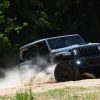 The 2021 Jeep Wrangler Rubicon 392 with the Xtreme Recon package driving up a path