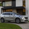 Front side view of 2022 Buick Enclave parked in front of house