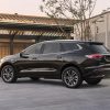 Rear side view of 2022 Buick Enclave parked in driveway