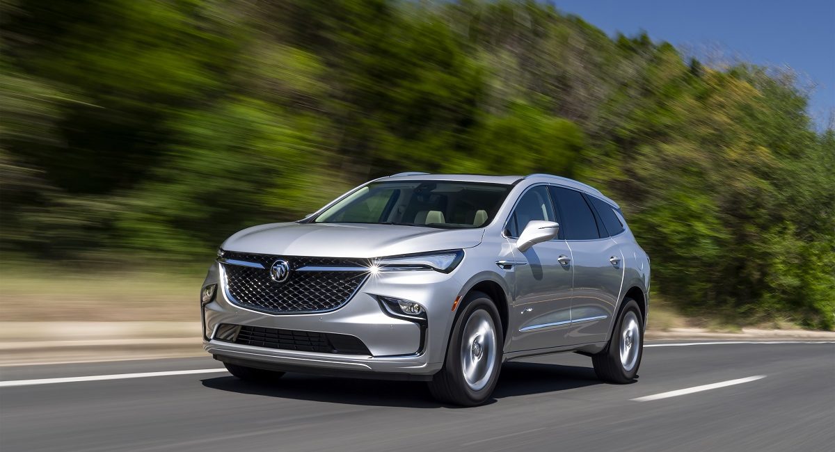 Front side view of 2022 Buick Enclave driving down road