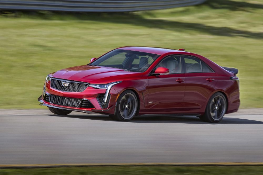 Side view of 2022 Cadillac CT4-V Blackwing driving on track