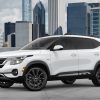 Outdoor photo of a white 2022 Kia Seltos Nightfall Edition in front of a city skyline