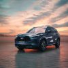 All-new 2022 INFINITI QX60 in front of a sunrise