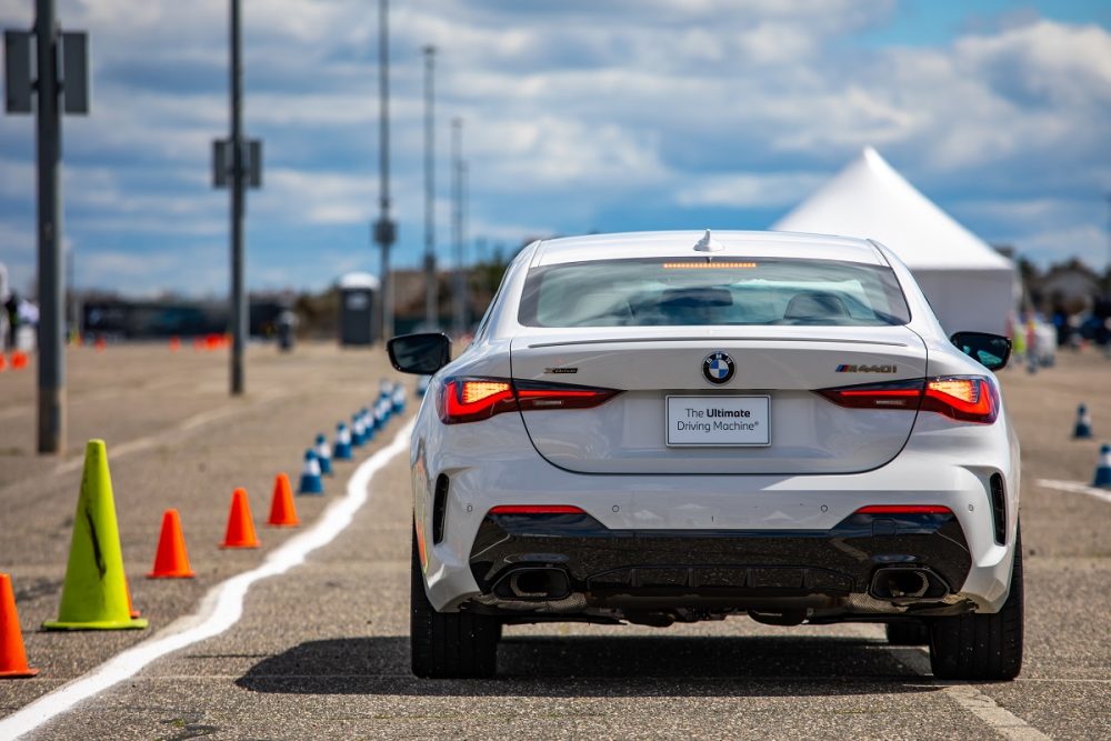 Rear photo of a BMW M440i at an Ultimate Driving Experience event