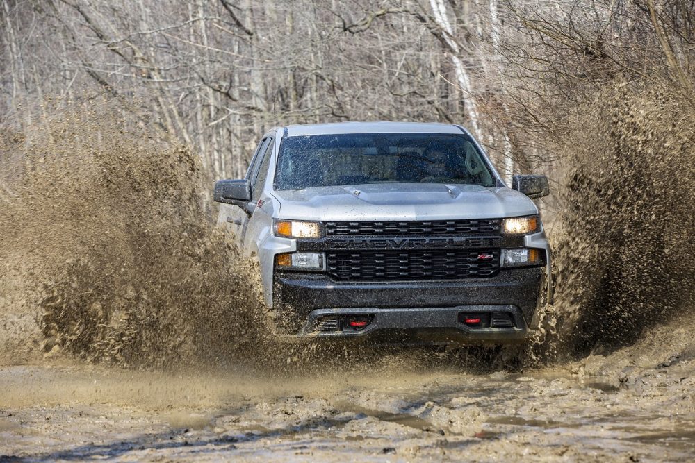 Front view of 2020 Chevrolet Silverado 1500 Custom Trail Boss driving through mud