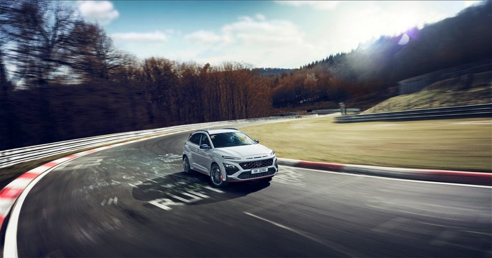 Front side overhead view of 2022 Hyundai Kona N rounding curve on track