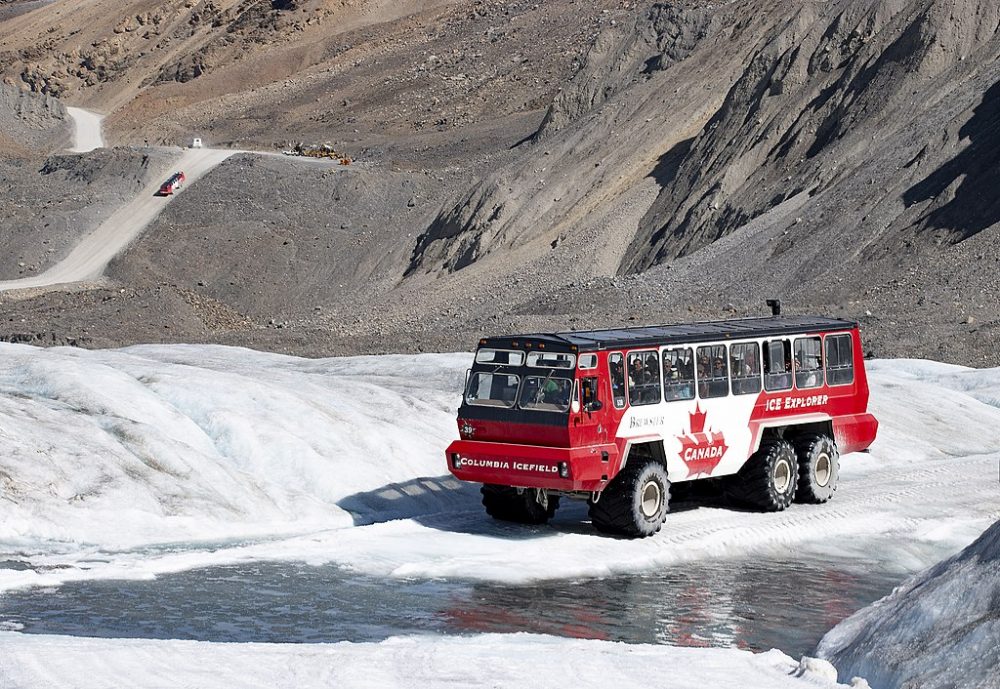 A tour bus driving on the Athabasca Glacier 