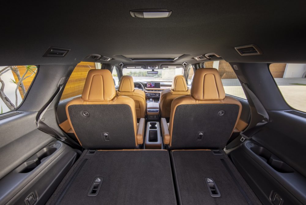 Interior of the 2022 INFINITI QX60 with the rear seats folded flat