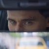Ad still: Loki's eyes are reflected in 2022 Hyundai Tucson rearview mirror