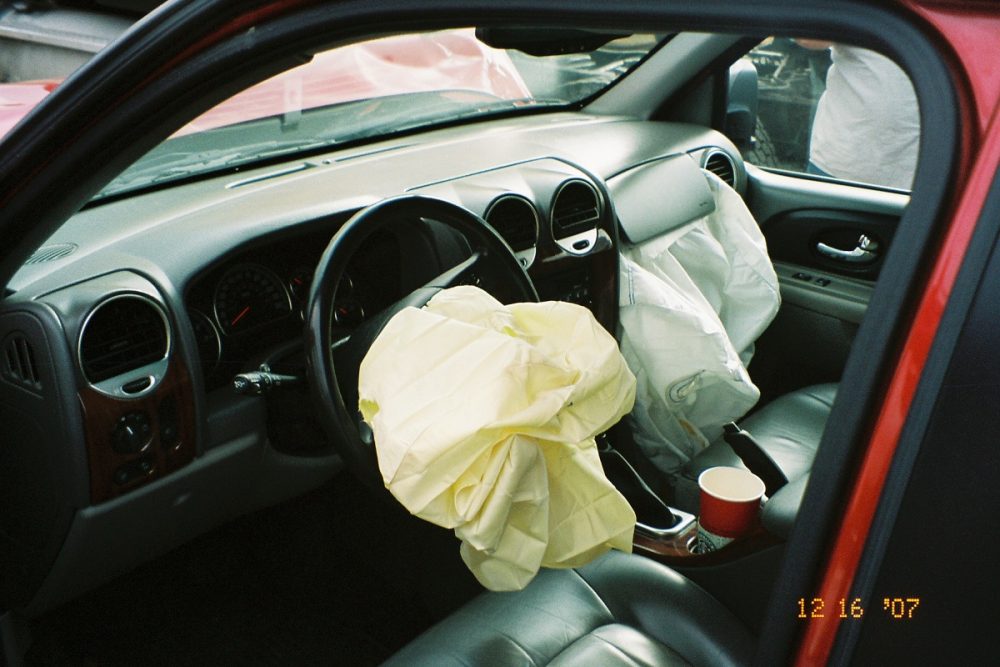 air bags deployed in steering wheel and passenger front side of a vehicle