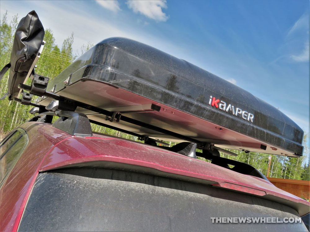 roof rack popup tent on red SUV camper