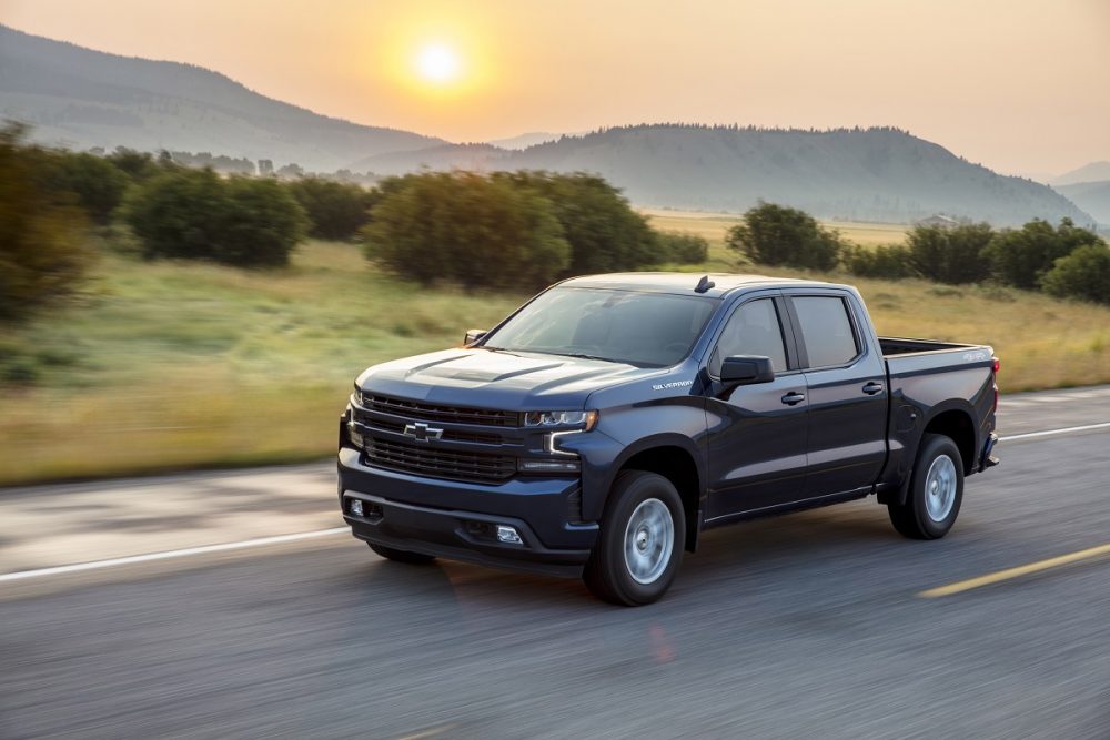 Front side view of 2021 Chevrolet Silverado 1500 RST driving down road