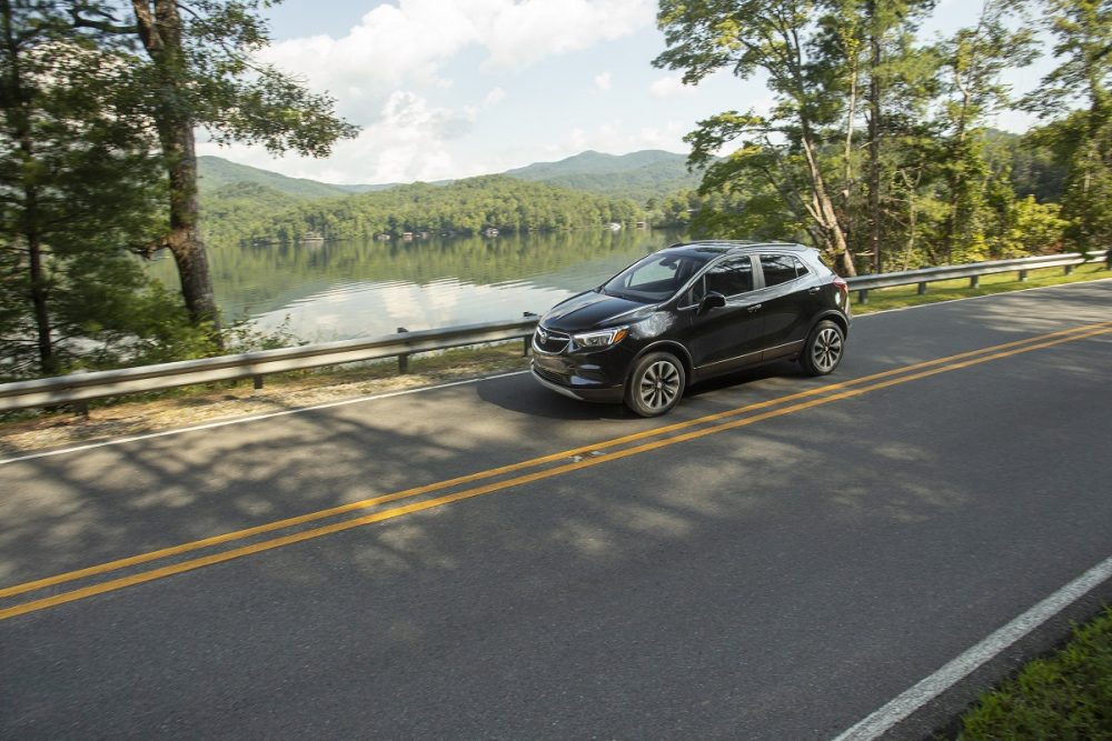 Overhead front side view of 2022 Buick Encore driving down road