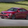 Front side view of 2022 Cadillac CT4-V Blackwing driving on track