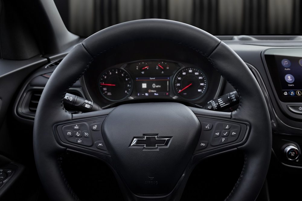 Close-up of 2022 Chevrolet Equinox steering wheel and driver display