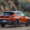 Rear of the 2022 Chevrolet Trailblazer in front of a rocky outcropping