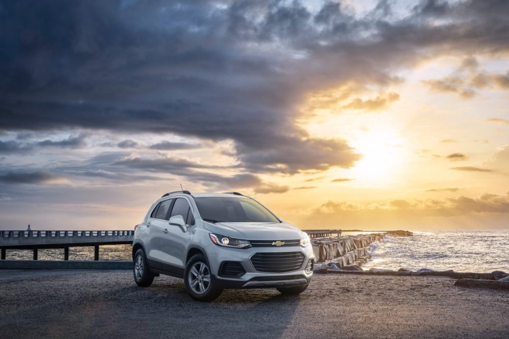 The 2022 Chevrolet Trax near the water at sunrise