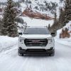 Front view of the 2022 GMC Terrain AT4 in a snowy landscape