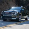 2022 GMC Terrain Denali driving alongside a mountain