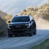 2022 GMC Terrain with the Elevation package, kicking up dust on the road