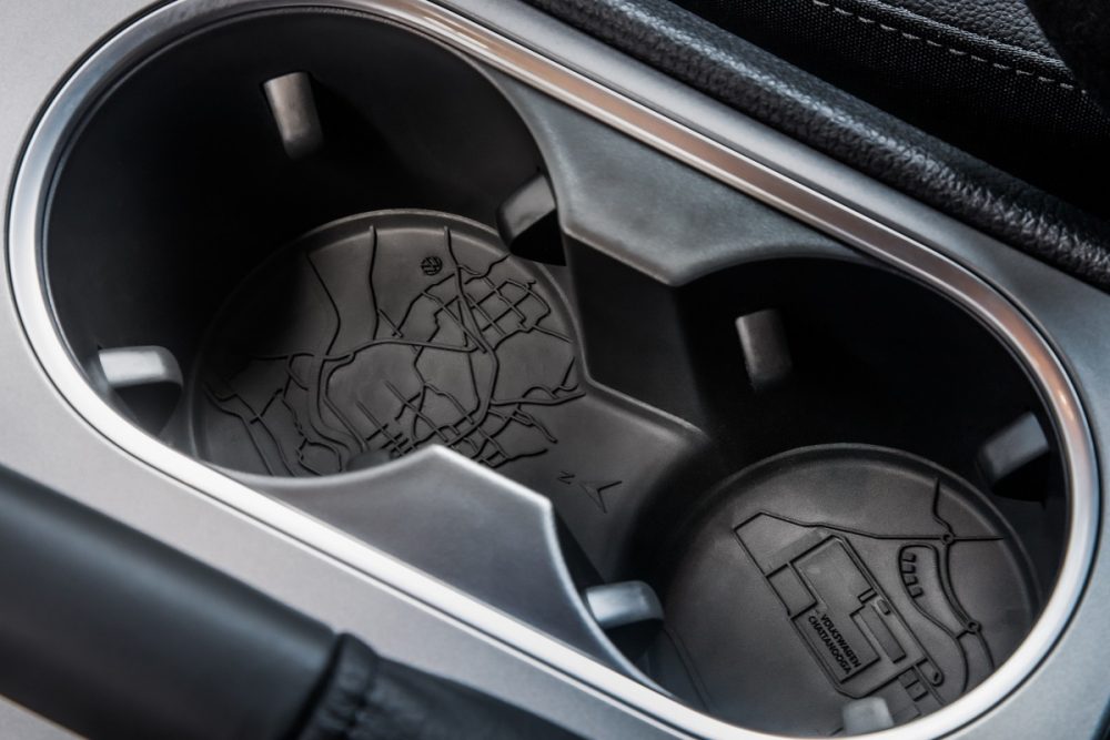 Close up of the 2022 Volkswagen Passat Limited Edition cup holders with aerial map designs