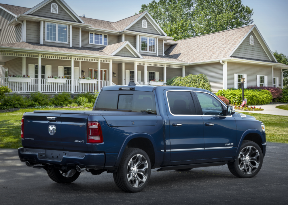 The rear of the 2022 Ram 1500 Limited 10th Anniversary Edition parked in front of a house