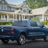 The rear of the 2022 Ram 1500 Limited 10th Anniversary Edition parked in front of a house